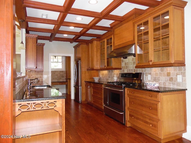 kitchen with coffered ceiling, beamed ceiling, stainless steel appliances, range hood, and tasteful backsplash