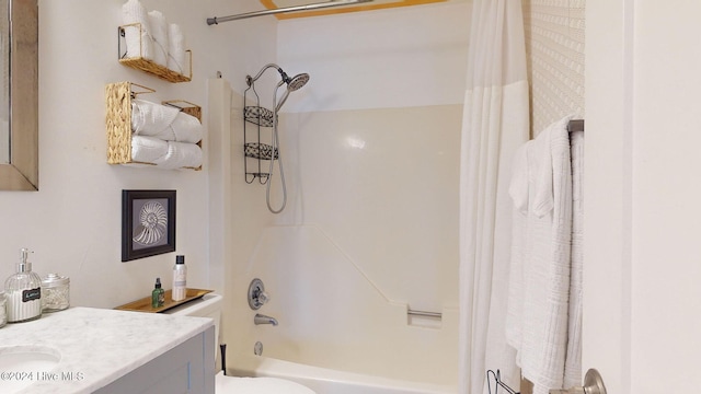 full bathroom with vanity, shower / bath combination with curtain, and toilet