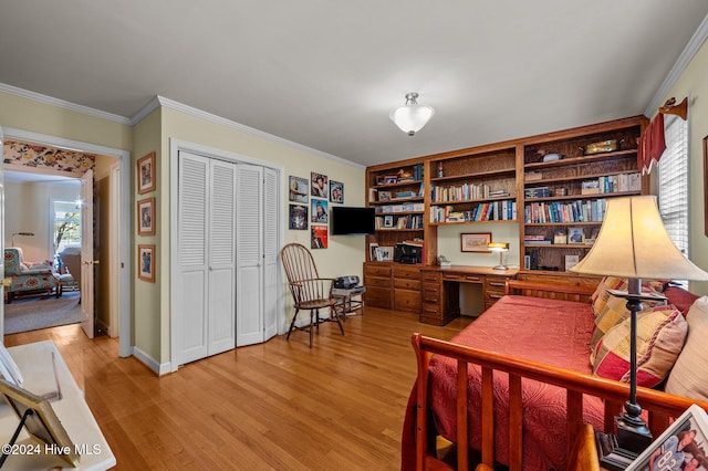 interior space with crown molding and light wood-type flooring