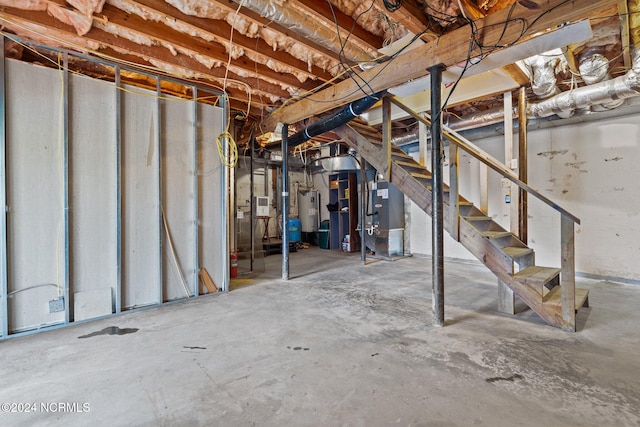 basement with water heater and heating unit