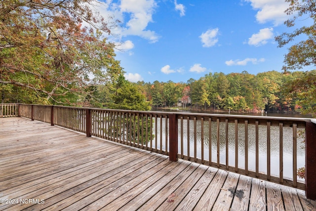 wooden deck with a water view