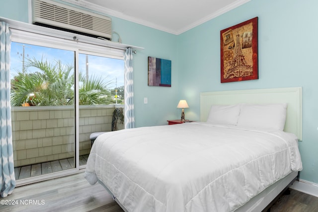 bedroom featuring ornamental molding and hardwood / wood-style floors