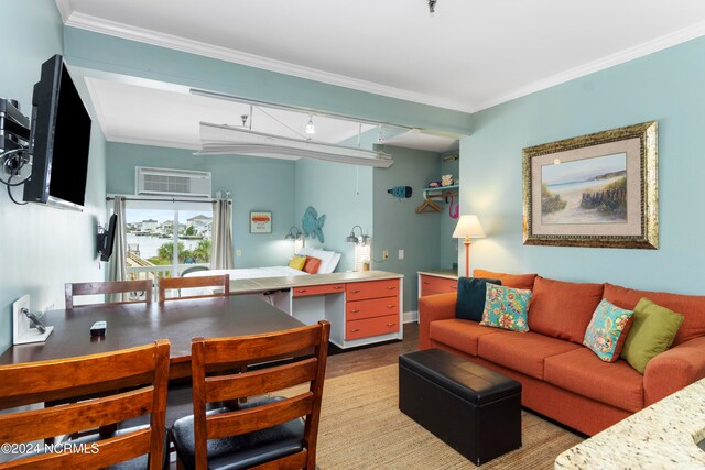 living room with an AC wall unit, crown molding, and light wood-type flooring