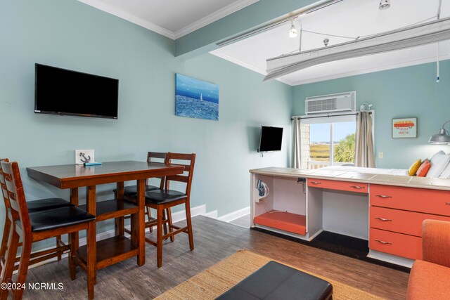 interior space featuring dark wood-type flooring, ornamental molding, and a wall mounted air conditioner