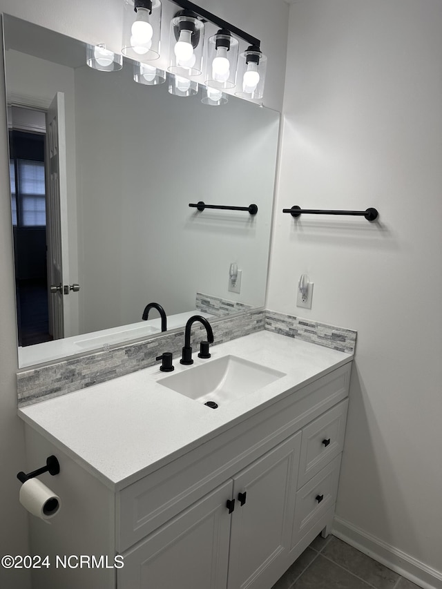 bathroom featuring tile patterned floors and vanity