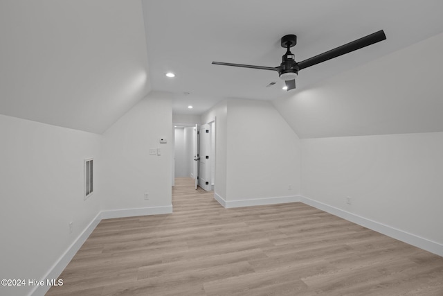 bonus room with ceiling fan, vaulted ceiling, and light hardwood / wood-style flooring