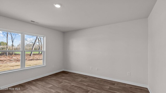 bathroom with hardwood / wood-style floors