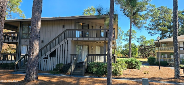 view of front facade with a balcony