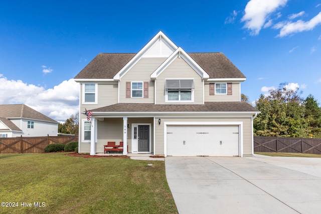 view of front facade featuring a front lawn and a garage