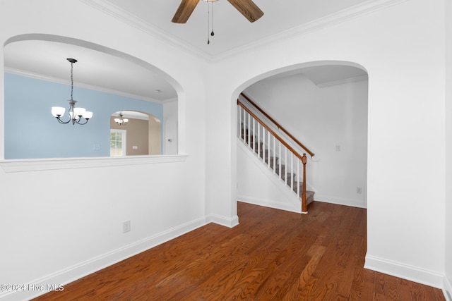 hall with crown molding, dark hardwood / wood-style floors, and a chandelier