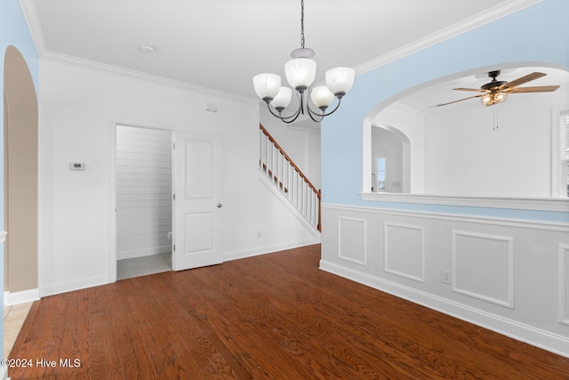 interior space with ornamental molding, hardwood / wood-style floors, and ceiling fan with notable chandelier