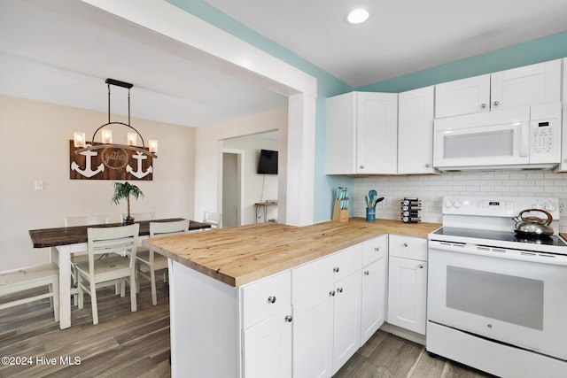 kitchen with white appliances, butcher block counters, dark hardwood / wood-style flooring, white cabinetry, and pendant lighting