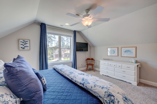 carpeted bedroom with lofted ceiling and ceiling fan