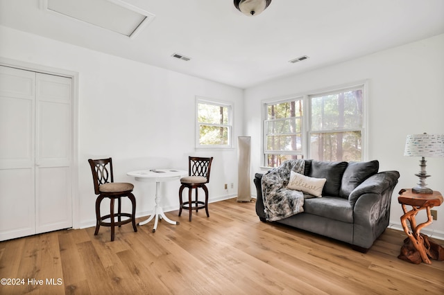 living area featuring light hardwood / wood-style floors