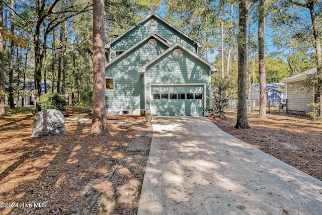 view of front of home with a garage