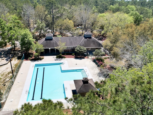 view of swimming pool featuring a patio