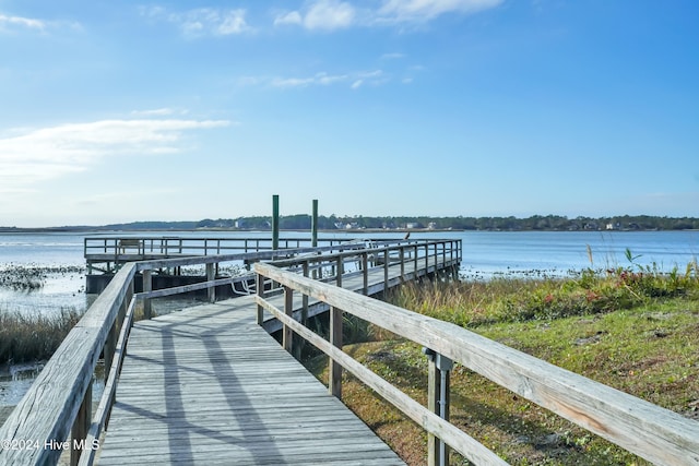 view of dock with a water view