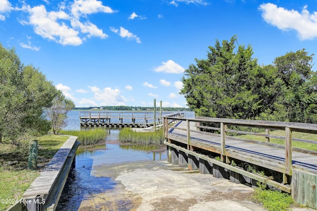 view of dock with a water view