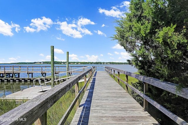 dock area featuring a water view