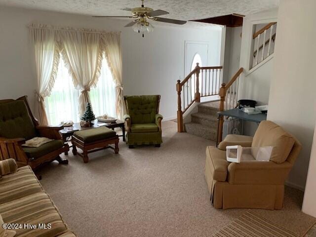 106 Summer Place Ln, Merry Hill, NC 27957 - living area with light colored carpet, ceiling fan, and stairway