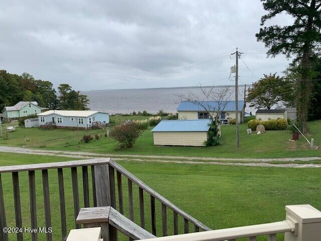 exterior space with a water view