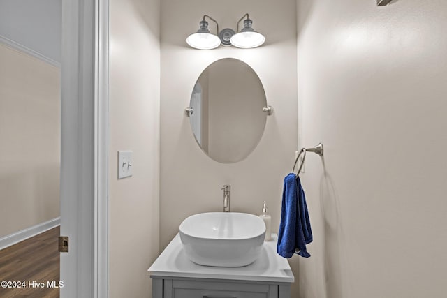 bathroom featuring vanity and hardwood / wood-style flooring