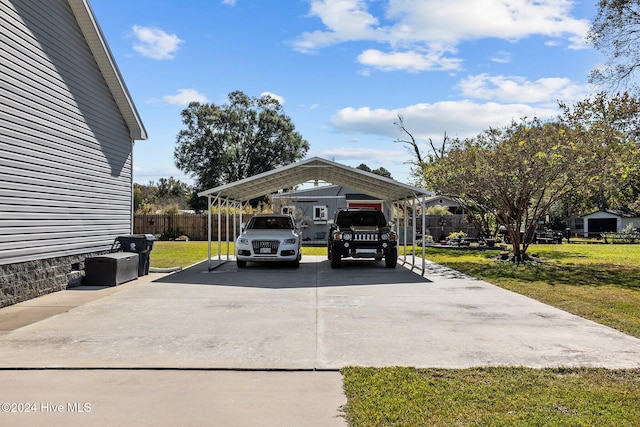 view of home's exterior featuring a yard and a carport