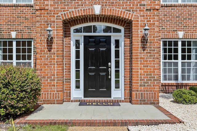 1109 Foxbow Cv, Leland, NC 28451 - doorway to property with brick siding