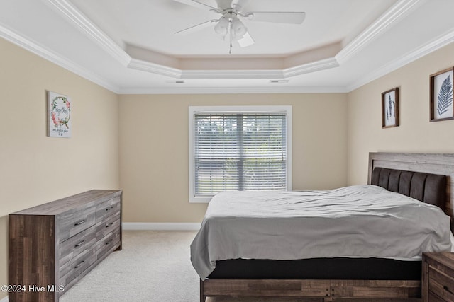 1109 Foxbow Cv, Leland, NC 28451 - bedroom with a raised ceiling, light colored carpet, ornamental molding, and ceiling fan