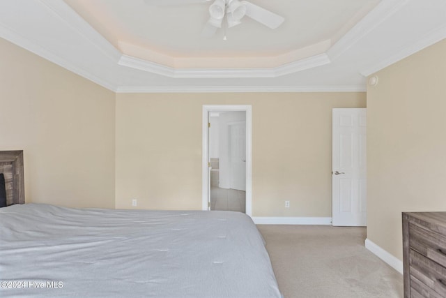 1109 Foxbow Cv, Leland, NC 28451 - bedroom featuring a raised ceiling, carpet flooring, ornamental molding, baseboards, and ceiling fan