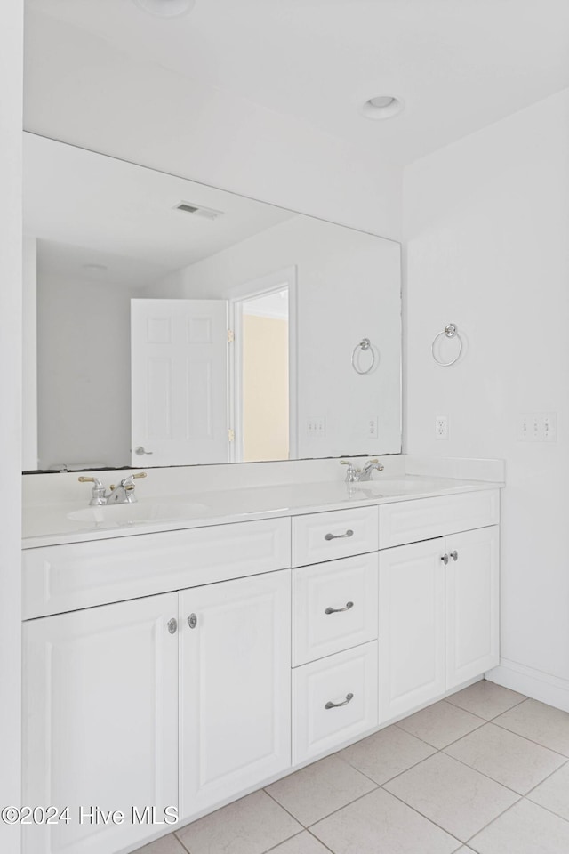 1109 Foxbow Cv, Leland, NC 28451 - bathroom featuring double vanity and tile patterned flooring