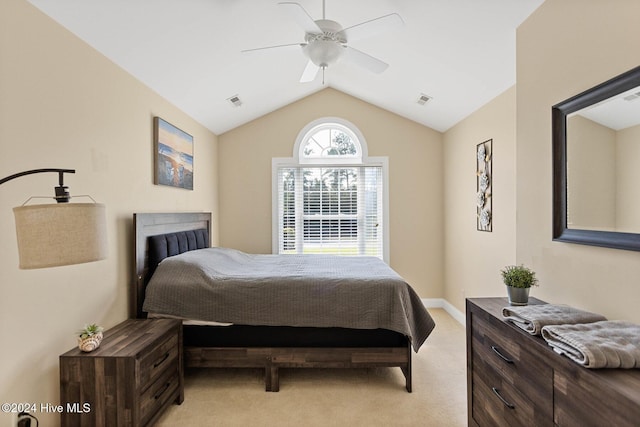 1109 Foxbow Cv, Leland, NC 28451 - bedroom with light colored carpet, lofted ceiling, a ceiling fan, and baseboards