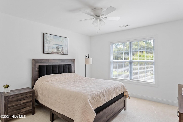 1109 Foxbow Cv, Leland, NC 28451 - bedroom featuring light colored carpet, baseboards, and ceiling fan