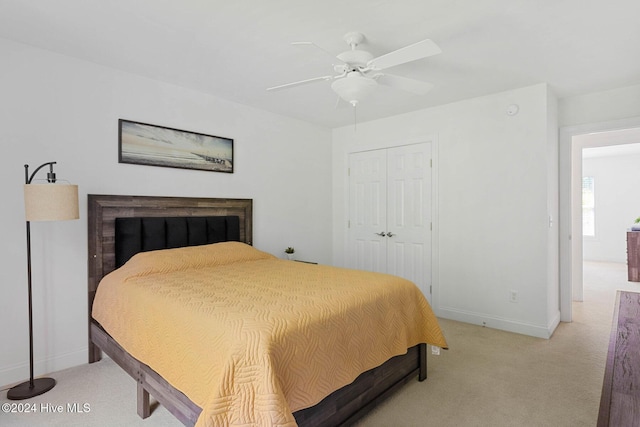 1109 Foxbow Cv, Leland, NC 28451 - bedroom with light colored carpet, a closet, and baseboards