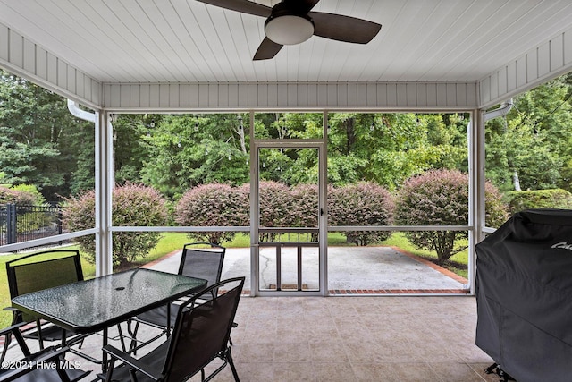 1109 Foxbow Cv, Leland, NC 28451 - sunroom / solarium featuring a ceiling fan, outdoor dining space, and healthy amount of natural light