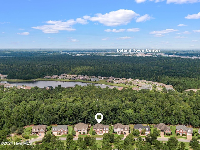 1109 Foxbow Cv, Leland, NC 28451 - aerial view of residential area featuring a forest and a large body of water