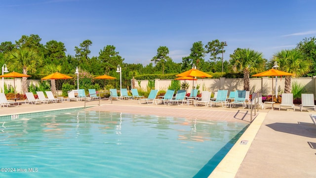 1109 Foxbow Cv, Leland, NC 28451 - community pool with a patio area