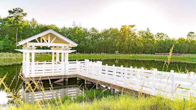 1109 Foxbow Cv, Leland, NC 28451 - dock area with a water view and a view of trees