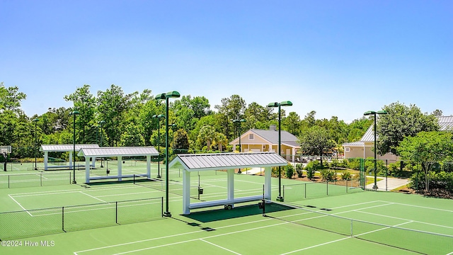 1109 Foxbow Cv, Leland, NC 28451 - view of tennis court featuring community basketball court