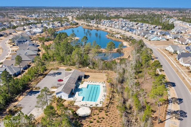 1109 Foxbow Cv, Leland, NC 28451 - aerial view of property's location with a pool area, nearby suburban area, and a nearby body of water