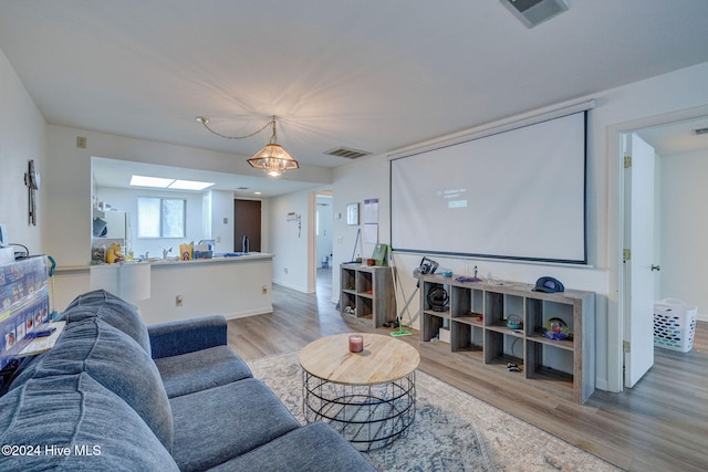 living room with light hardwood / wood-style flooring