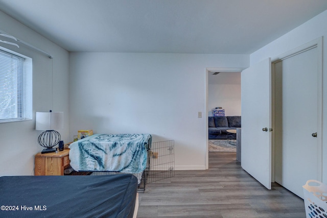 bedroom with light wood-type flooring