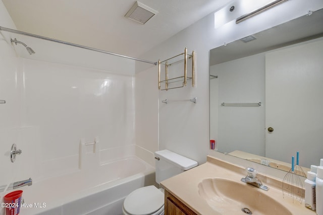 full bathroom featuring shower / tub combination, vanity, and toilet