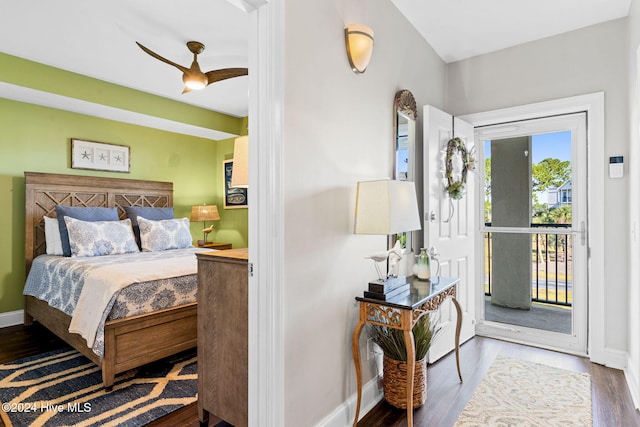 bedroom featuring access to outside, hardwood / wood-style flooring, and ceiling fan