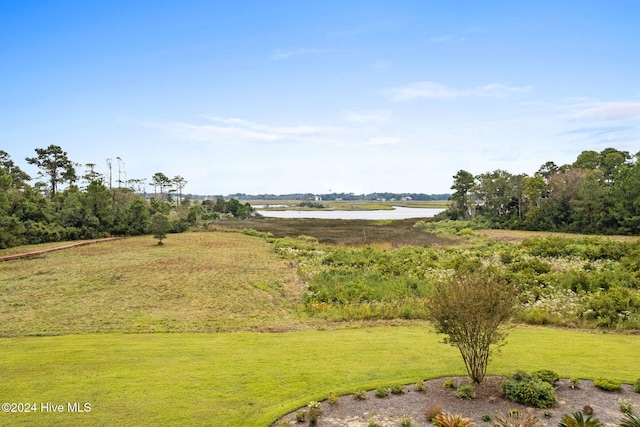 view of yard with a water view