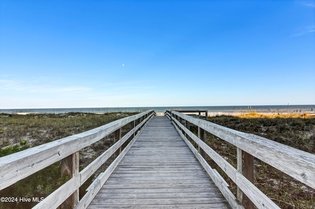 view of dock with a water view