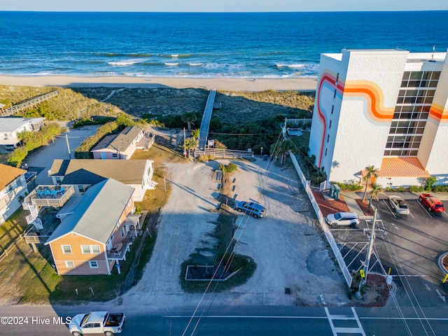 aerial view featuring a water view and a view of the beach