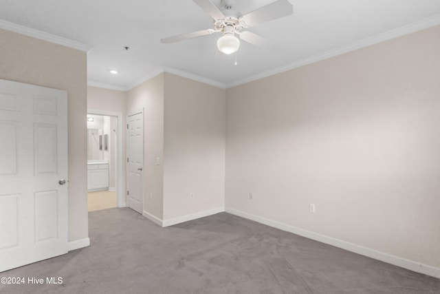 unfurnished bedroom with light carpet, ceiling fan, and ornamental molding