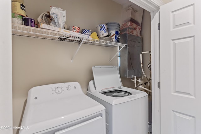 laundry room with washing machine and dryer