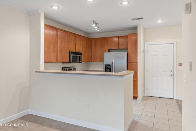 kitchen featuring kitchen peninsula, stainless steel fridge with ice dispenser, and light tile patterned flooring